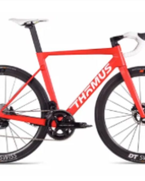 1st prize — red and white THÖMUS road bike, DT Swiss wheels, worth 4 000 CHF, donated by THÖMUS
